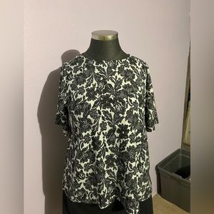 Lane Bryant short sleeve top. Lace up detail in back.